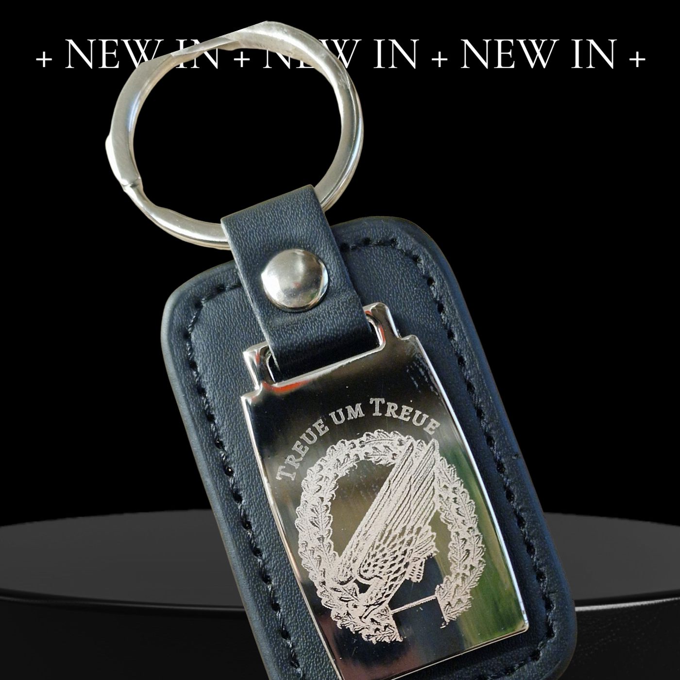 Schlüsselanhänger mit graviertem Emblem